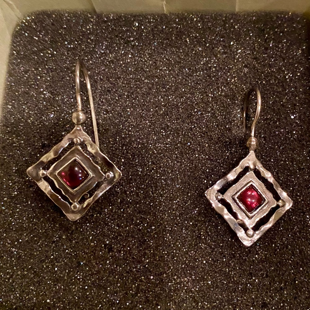 Silver earrings with red gem